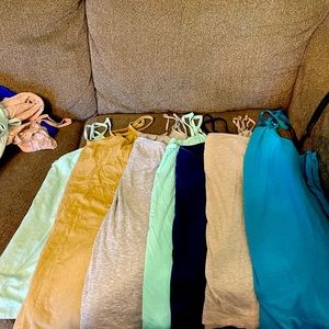 Set of 7 spaghetti strap undershirts. Fits 2x loose 3x normal and 4x tight.